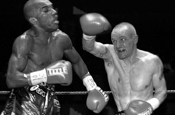 Alan Bosworth socks Junior Witter with a right hand