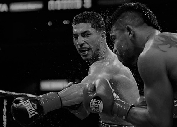 Lopez clips Ortiz with a left hook