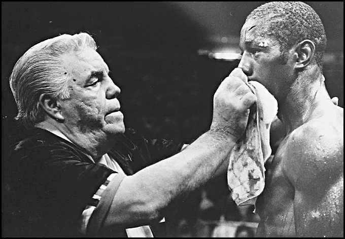 Lou Duva tends to Johnny Bumphus